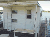 Floating cabin at Lake Whitney Marina