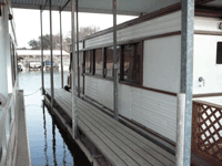Boat docks, slips, and floating cabins - Lake Whitney Marina